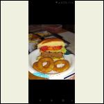 Loaded pork burger and onion rings